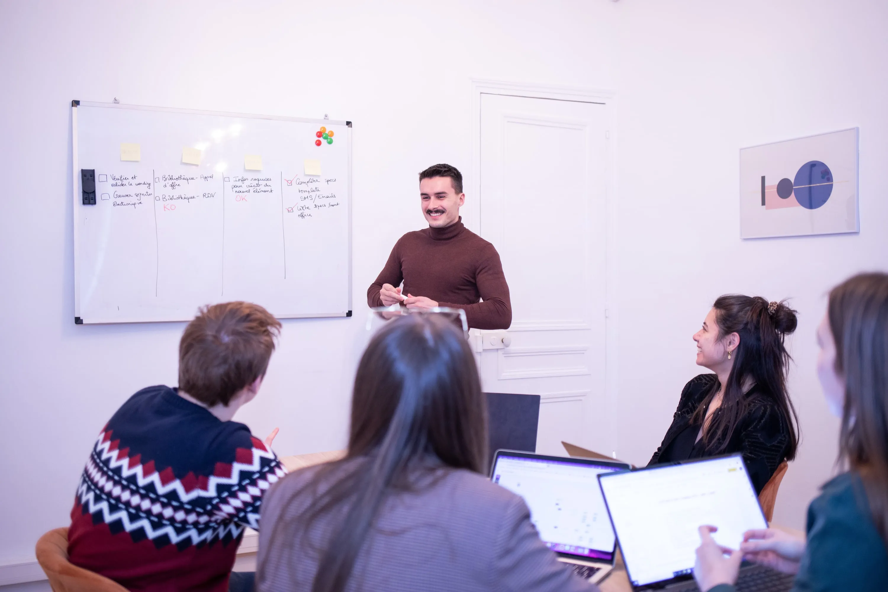 Illustrative image of a man presenting a painting